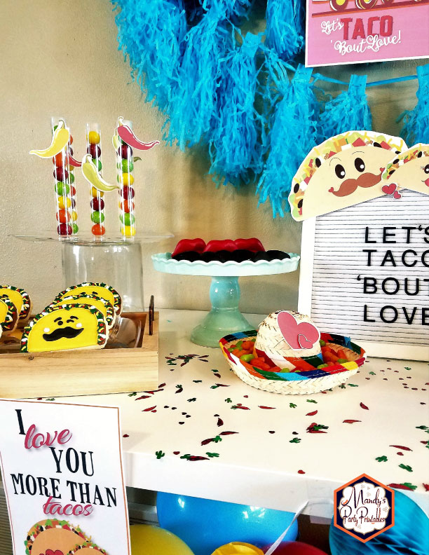 Gumball holders, taco cookies, and candy-filled sombrero from a Taco Bout Love Valentine Taco Party | Mandy's Party Printables #valentineparty #tacoparty #tacoboutlove #ilovetacos #MPP #fiesta