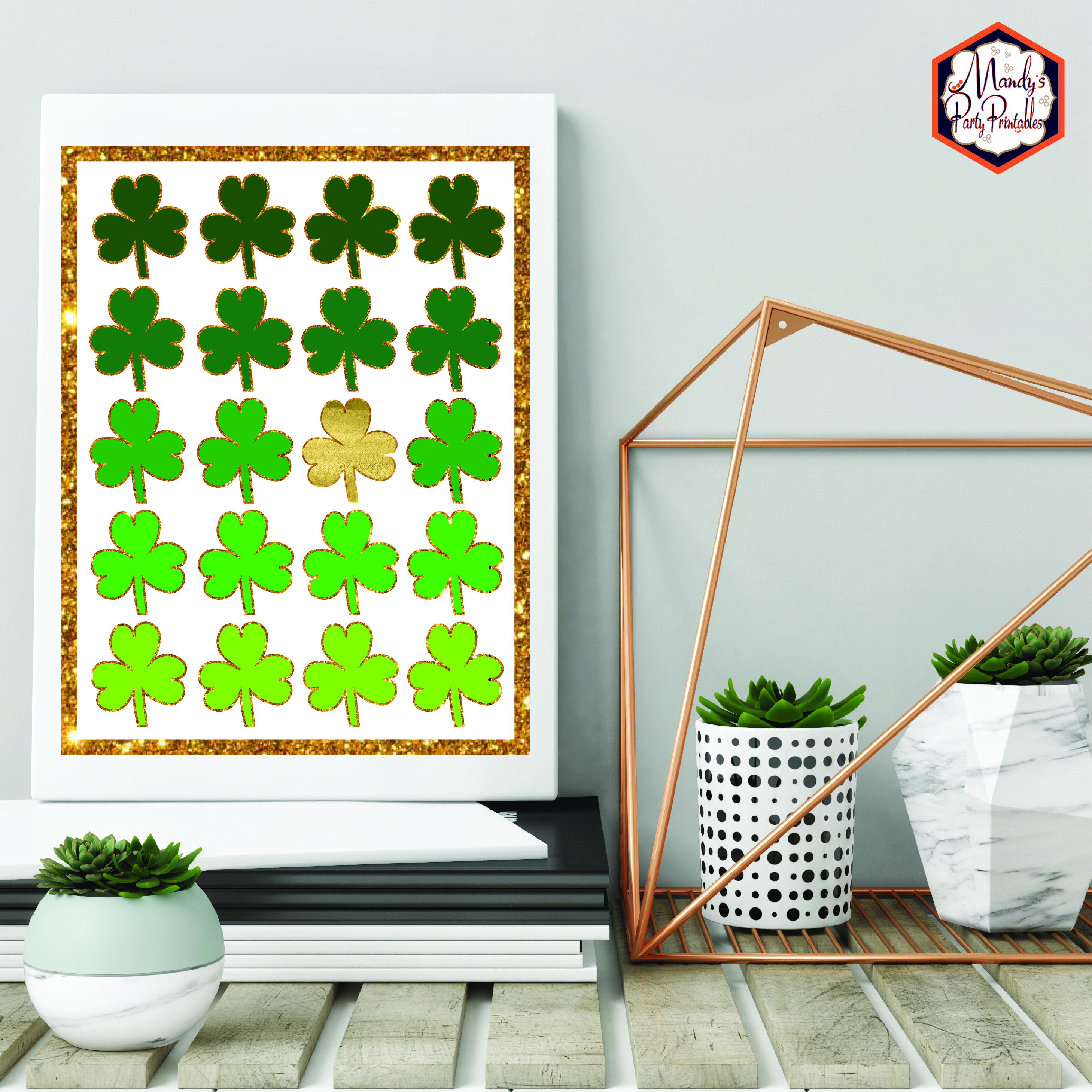 gold sparkly bordered shamrock 8x10 free printable sign on a desk with succulents flanking | Mandy's Party Printables